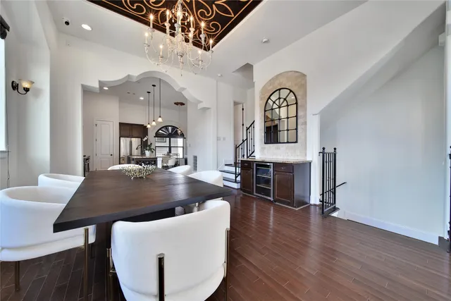 a living room with fireplace furniture and a wooden floor