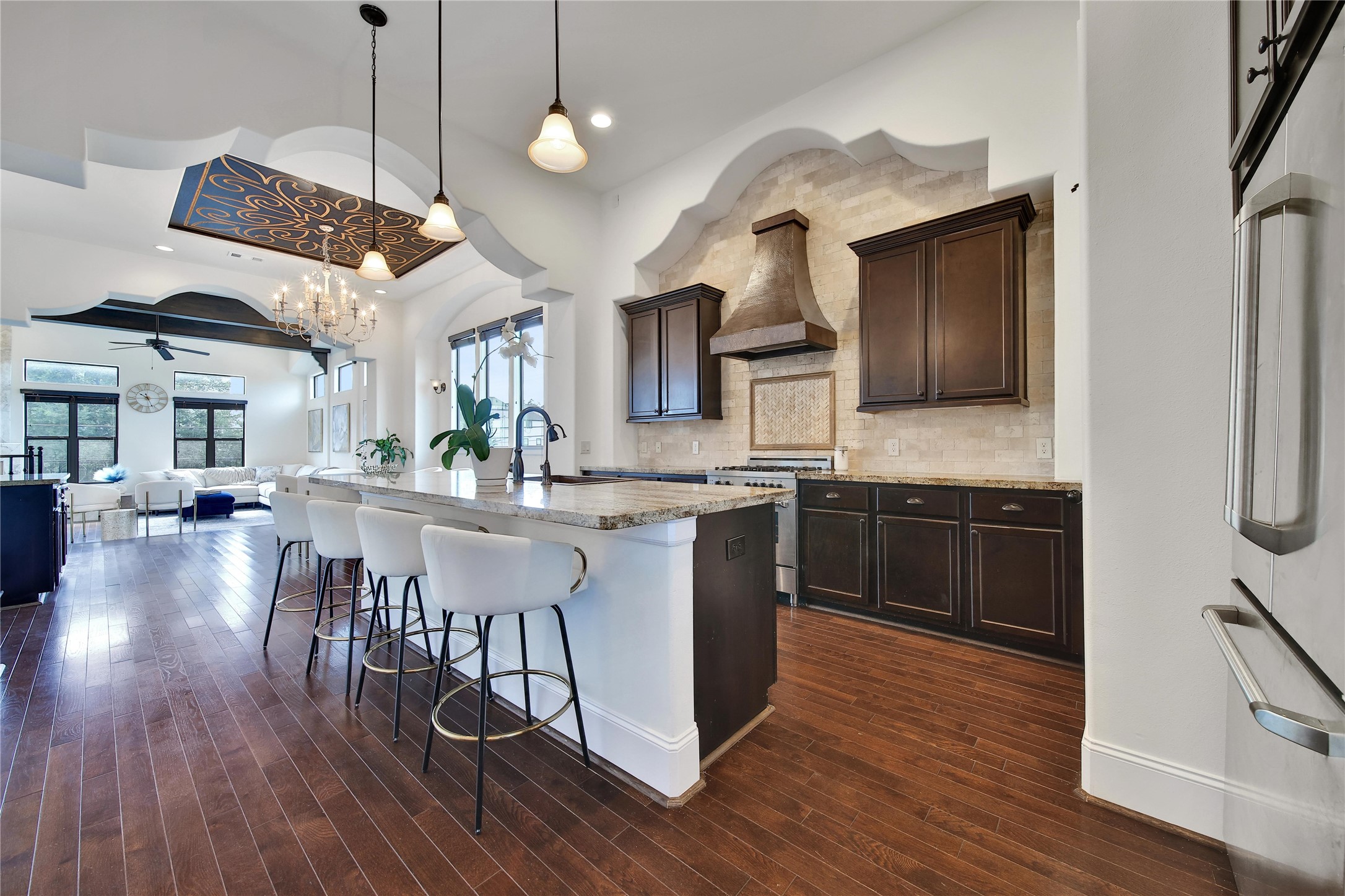 2301 Couch Street Houston, TX 77008 - Photo 14 of 22 a kitchen with a counter space a sink appliances and cabinets