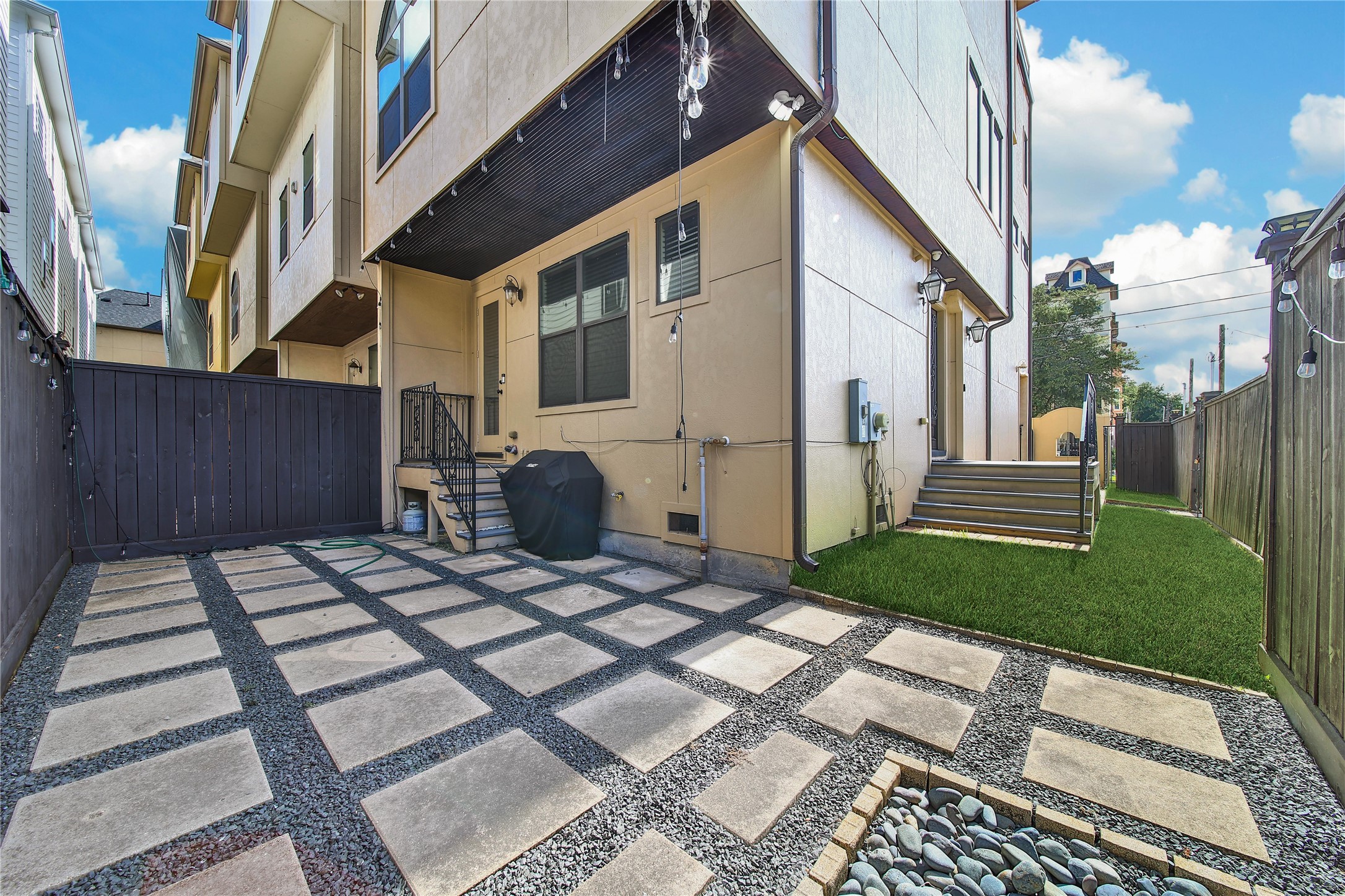 2301 Couch Street Houston, TX 77008 - Photo 4 of 22 a view of a house with a yard