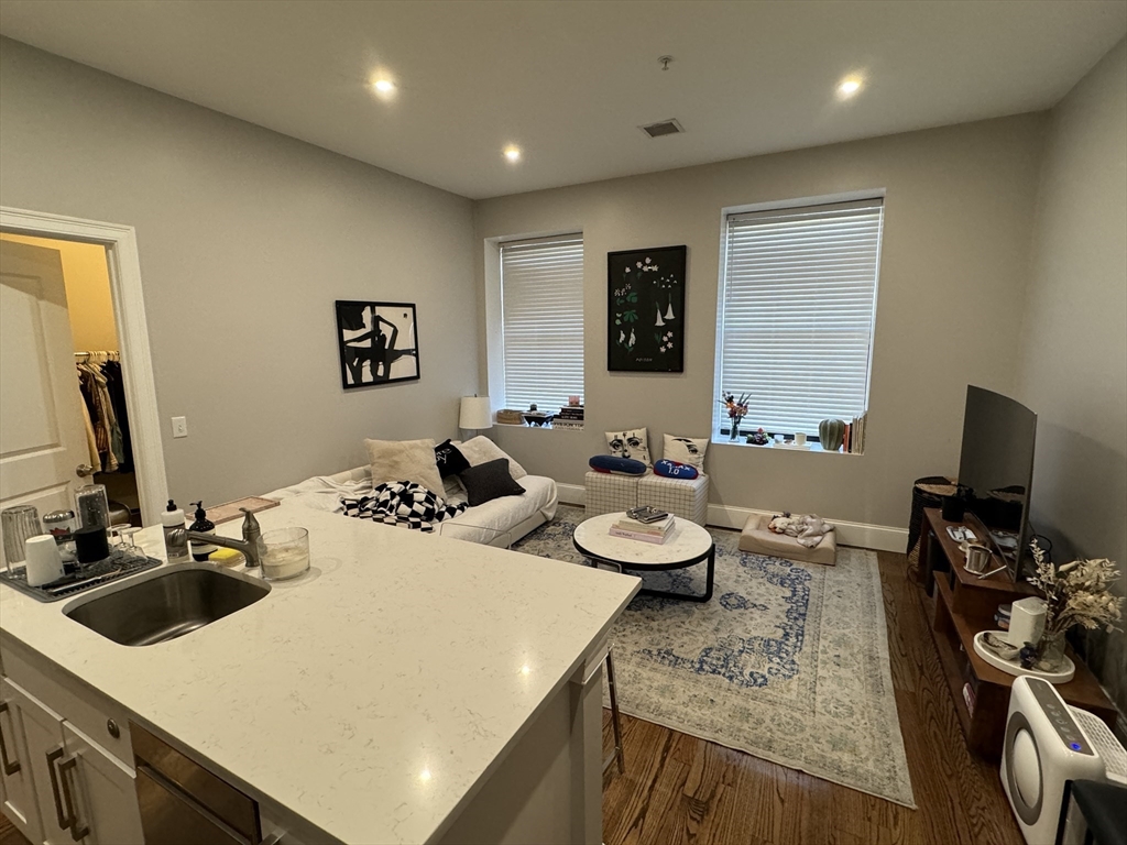 27 Dudley Street, Unit 6 Boston, MA 02119 - Photo 3 of 8 a view of a dining room with furniture