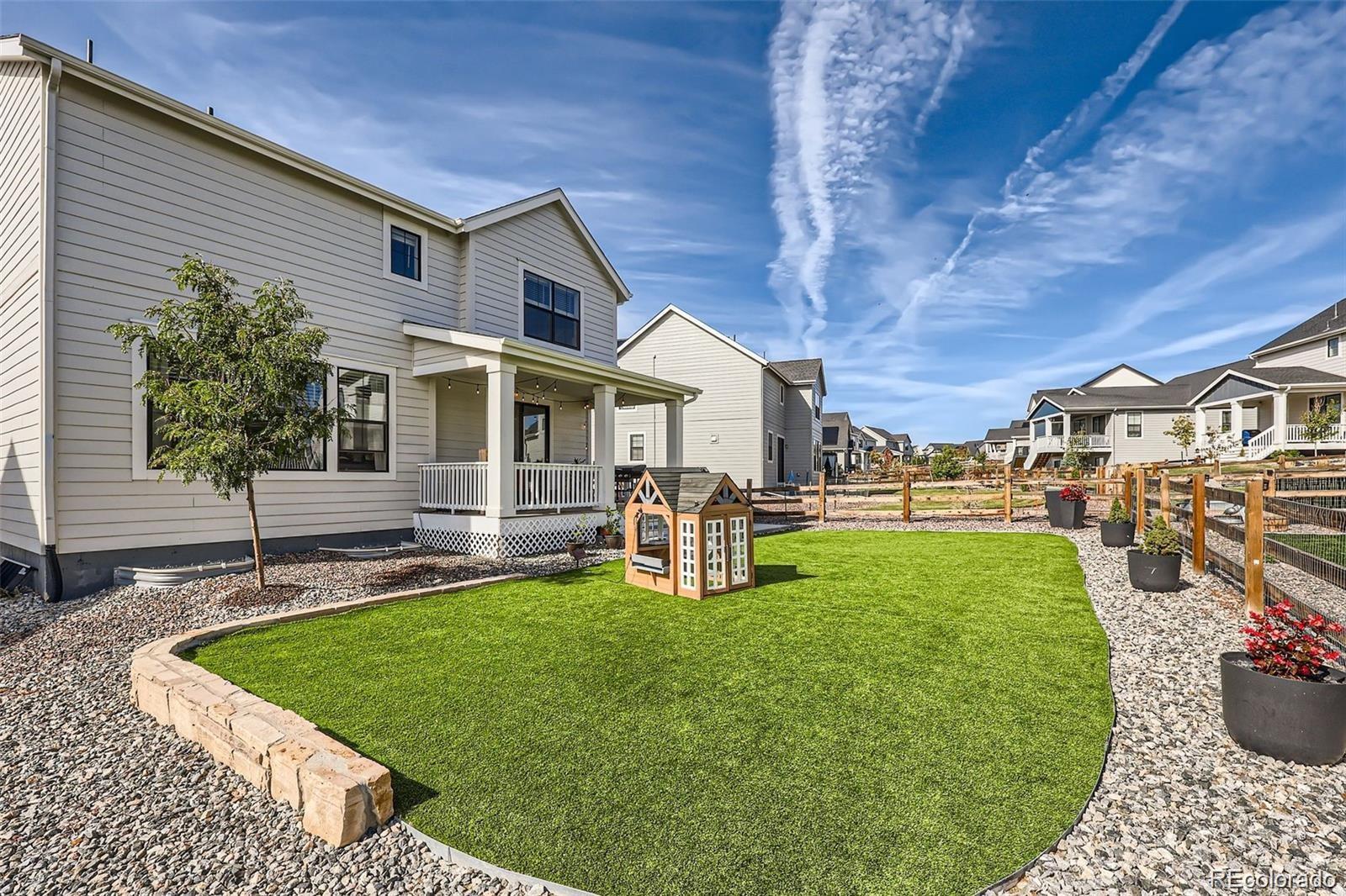 1173 Williams Loop Elizabeth, CO 80107 - Photo 25 of 30 a view of a house with backyard porch and sitting area