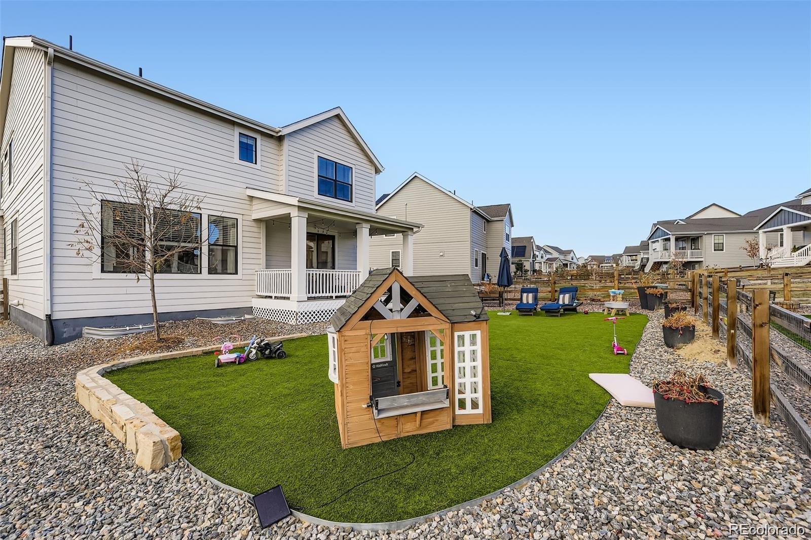 1173 Williams Loop Elizabeth, CO 80107 - Photo 29 of 30 a front view of a house with a yard