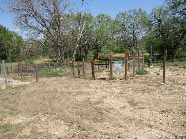 a view of lake with green space