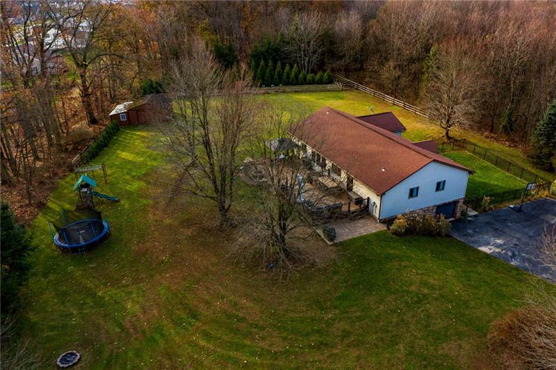 140 Stoup Road Mars, PA 16046 - Photo 2 of 25 Lots of privacy with over 2 acres on a level lot in heart of Adams Township.