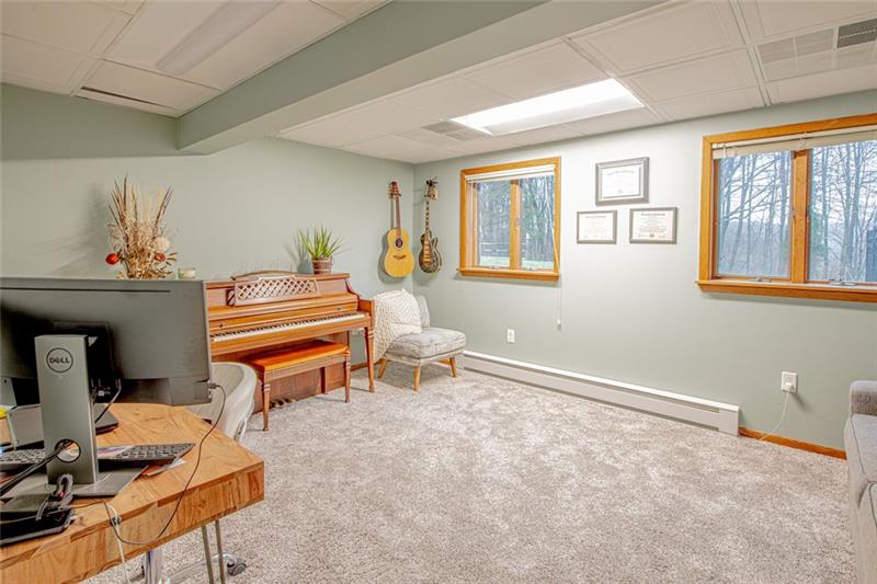 140 Stoup Road Mars, PA 16046 - Photo 19 of 25 Lower level boasts room for an office, den or playroom with new plush carpet.