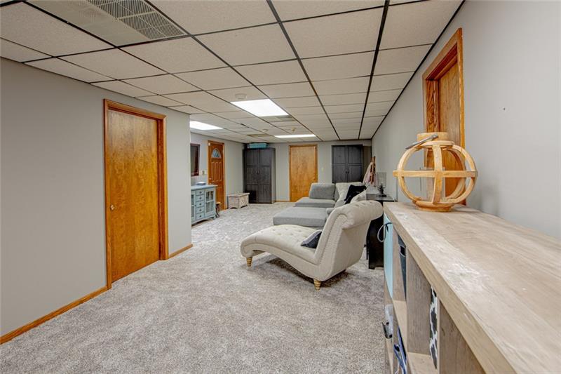 140 Stoup Road Mars, PA 16046 - Photo 20 of 25 Lower level family room with new neutral carpet.