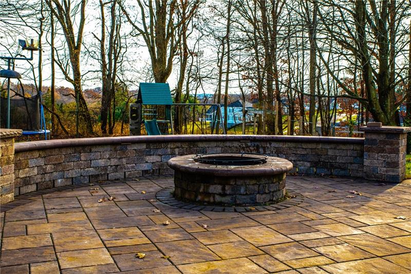 140 Stoup Road Mars, PA 16046 - Photo 22 of 25 Rear view of this stunning home complete with stone pavers and fire pit perfect for entertaining.