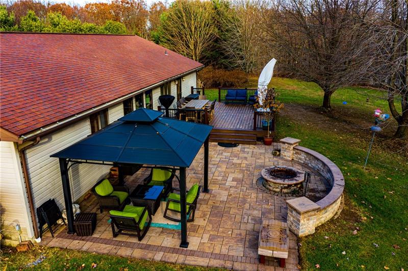 140 Stoup Road Mars, PA 16046 - Photo 23 of 25 Relax on the rear oversized maintenance free Trex deck and enjoy the sounds of nature or family get togethers.