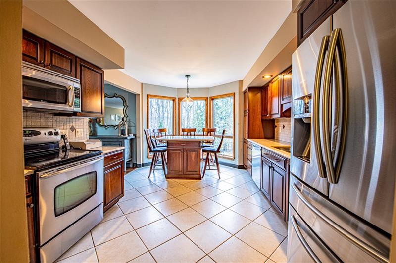 140 Stoup Road Mars, PA 16046 - Photo 7 of 25 Bright and airy eat in kitchen area complete with stainless steel appliances.