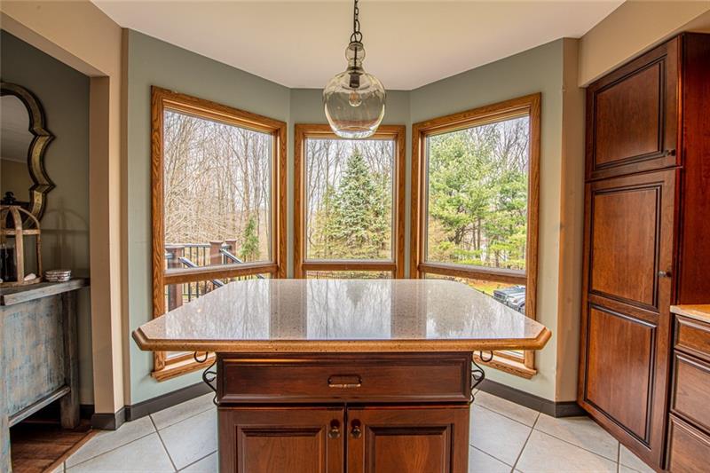 140 Stoup Road Mars, PA 16046 - Photo 8 of 25 This kitchen also has an island that can accommodate stools for casual dining.