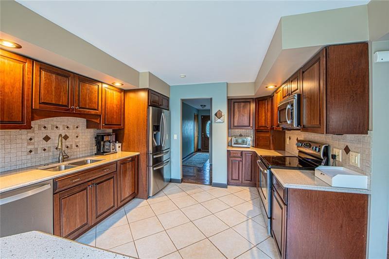 140 Stoup Road Mars, PA 16046 - Photo 9 of 25 Another view of kitchen with custom tile backsplash.