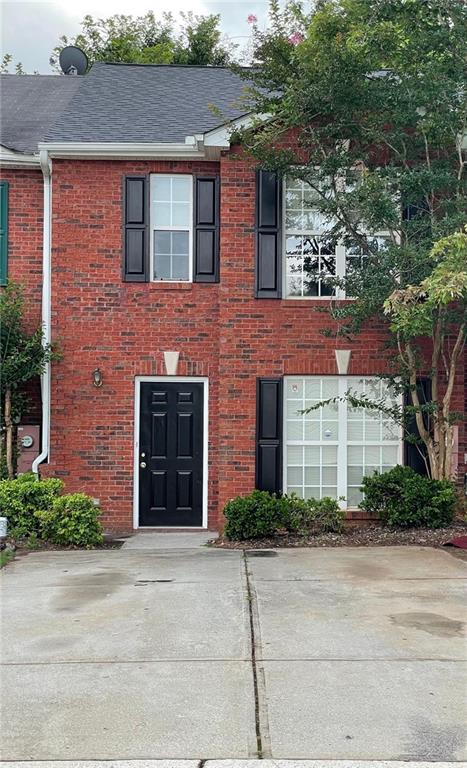 3032 Waldrop Circle Decatur, GA 30034 - Photo 1 of 1 a front view of a house with a yard and garage