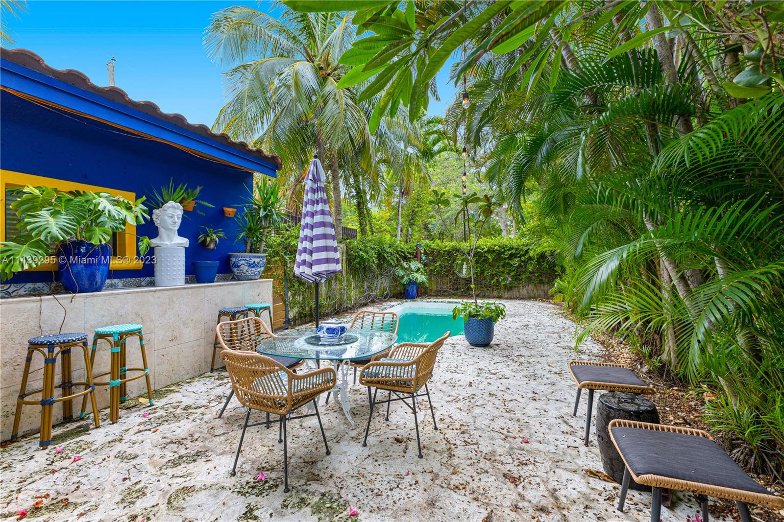 201 Southwest 24th Road Miami, FL 33129 - Photo 12 of 18 a view of a chairs and table in a patio