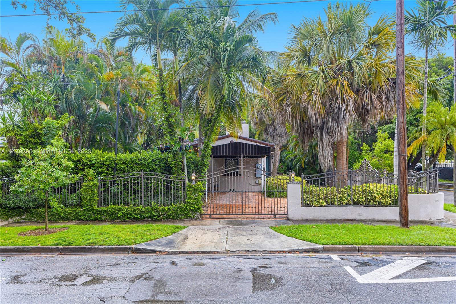 201 Southwest 24th Road Miami, FL 33129 - Photo 18 of 18 a front view of a house with garden