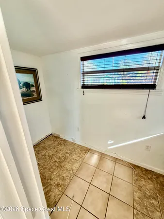 a view of livingroom with table and chair