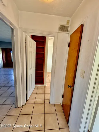a view of bathroom with a sink and shower