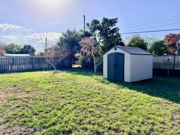 a view of a backyard with a garden