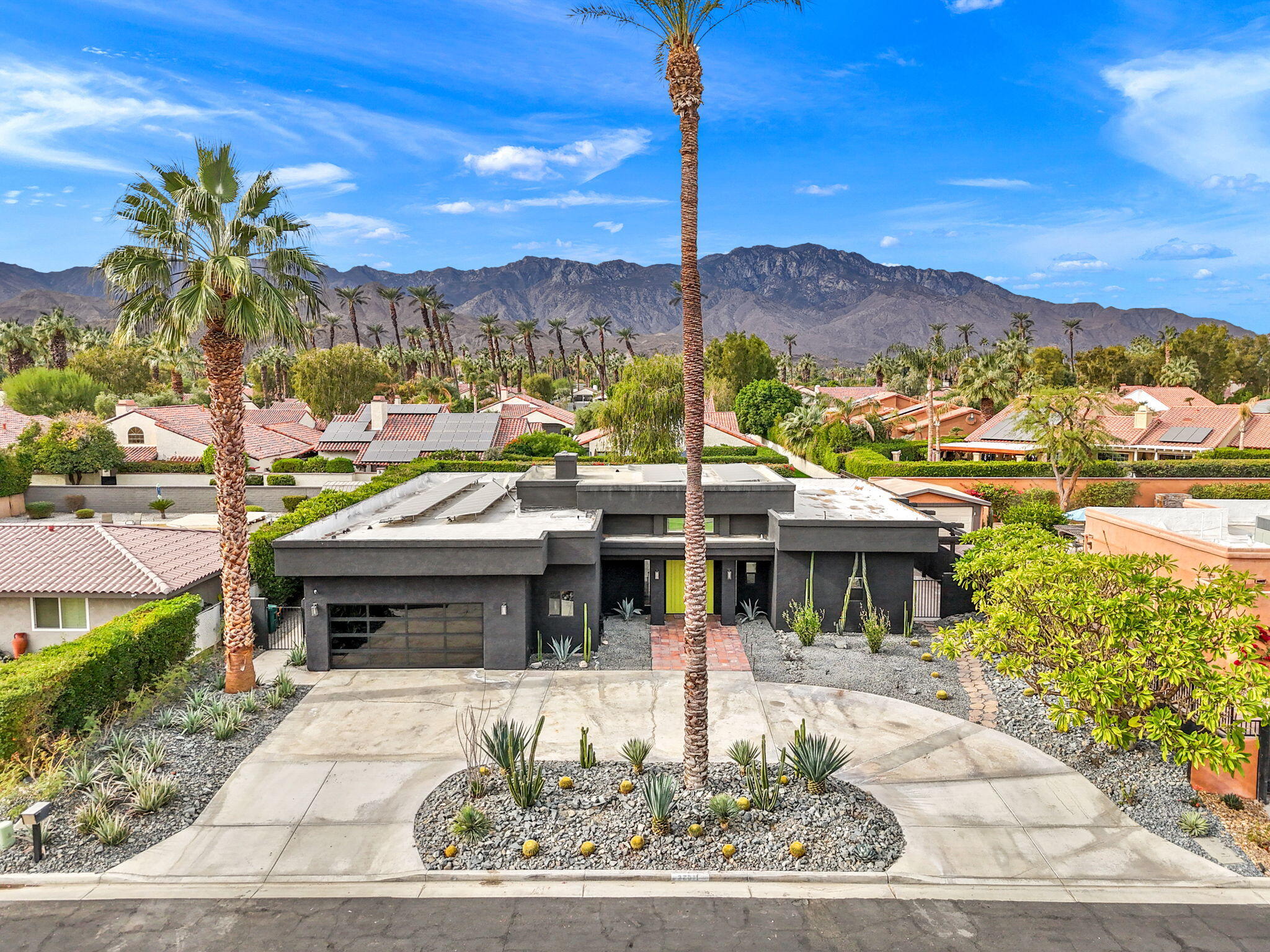 37011 Palmdale Road Rancho Mirage, CA 92270 - Photo 1 of 63 a view of a patio with a table and chairs