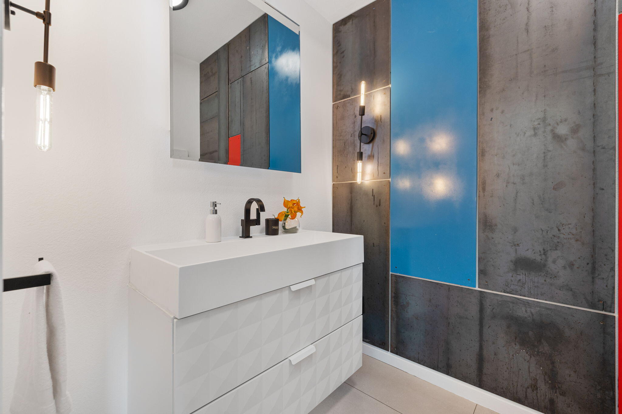 37011 Palmdale Road Rancho Mirage, CA 92270 - Photo 11 of 63 a bathroom with a sink and a mirror