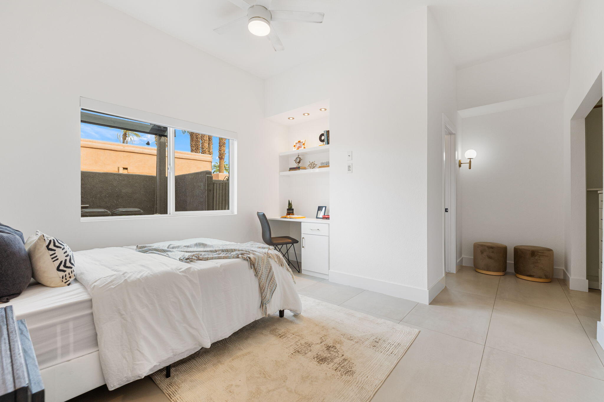37011 Palmdale Road Rancho Mirage, CA 92270 - Photo 22 of 63 a bedroom with a bed and a window