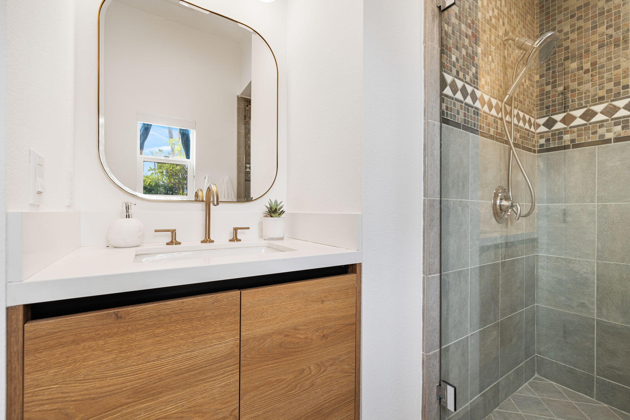 37011 Palmdale Road Rancho Mirage, CA 92270 - Photo 25 of 63 a bathroom with a sink and a mirror
