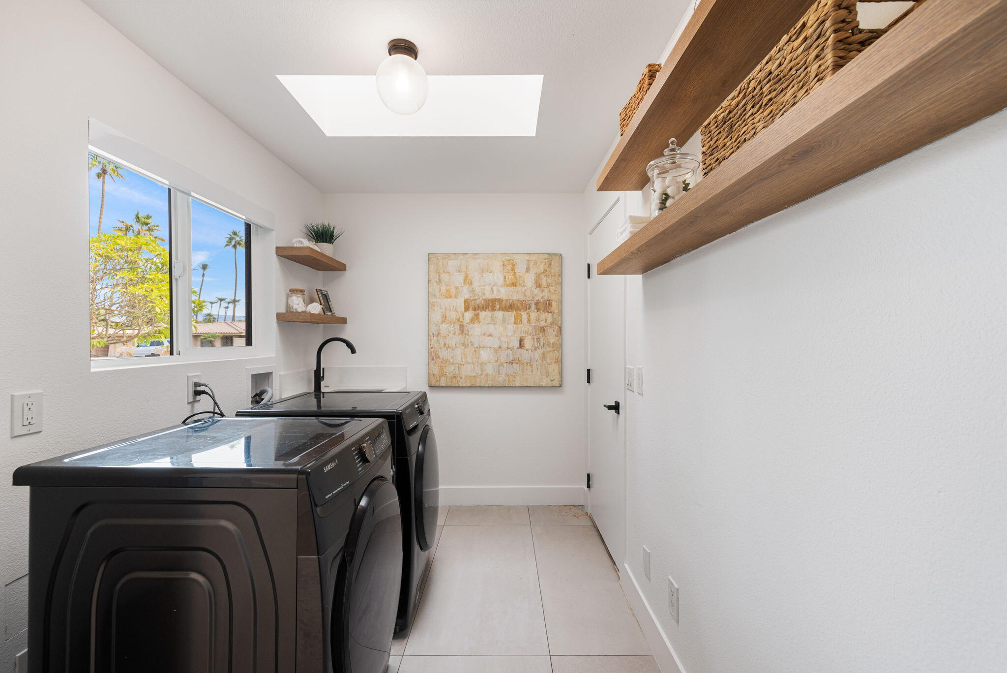 37011 Palmdale Road Rancho Mirage, CA 92270 - Photo 27 of 63 a utility room with window dryer and washer