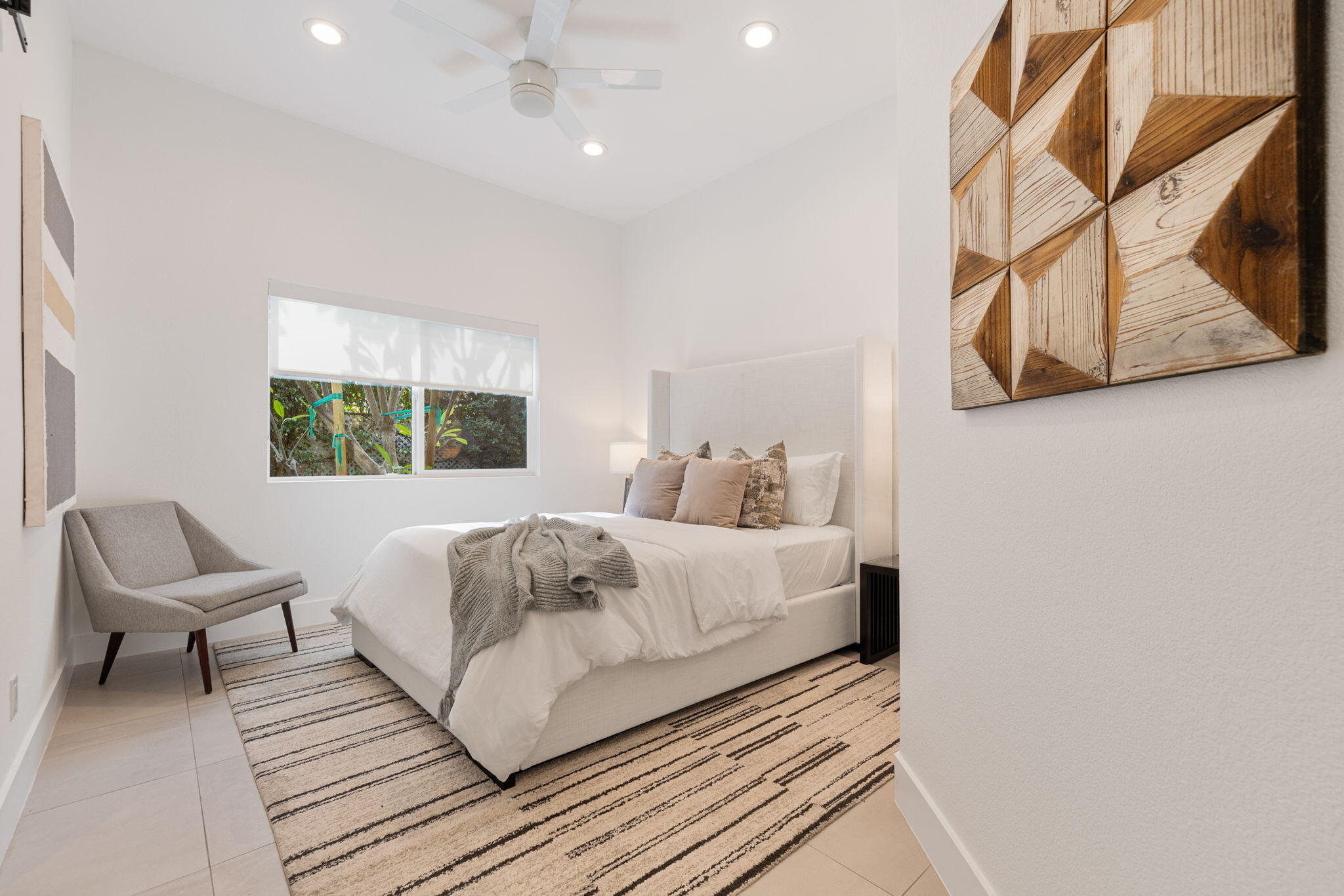 37011 Palmdale Road Rancho Mirage, CA 92270 - Photo 30 of 63 a bedroom with a bed and wooden floor
