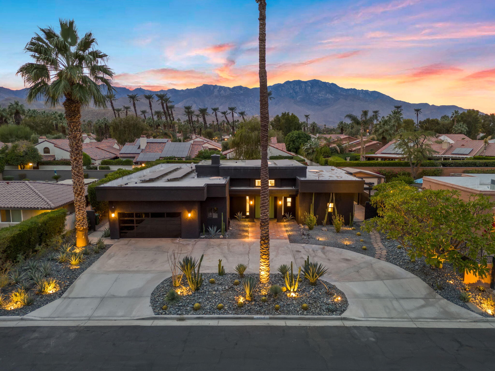 37011 Palmdale Road Rancho Mirage, CA 92270 - Photo 3 of 63 a view of a swimming pool with a patio