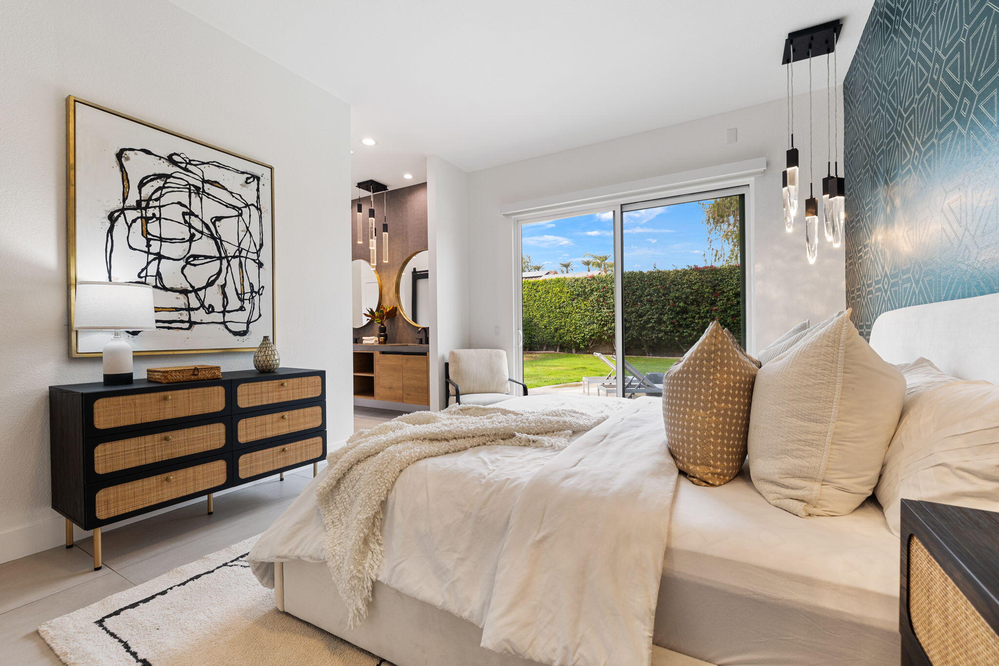 37011 Palmdale Road Rancho Mirage, CA 92270 - Photo 36 of 63 a bedroom with a bed and a window
