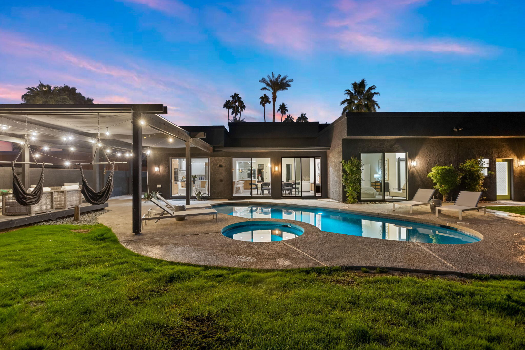 37011 Palmdale Road Rancho Mirage, CA 92270 - Photo 44 of 63 a view of a house with backyard and sitting area