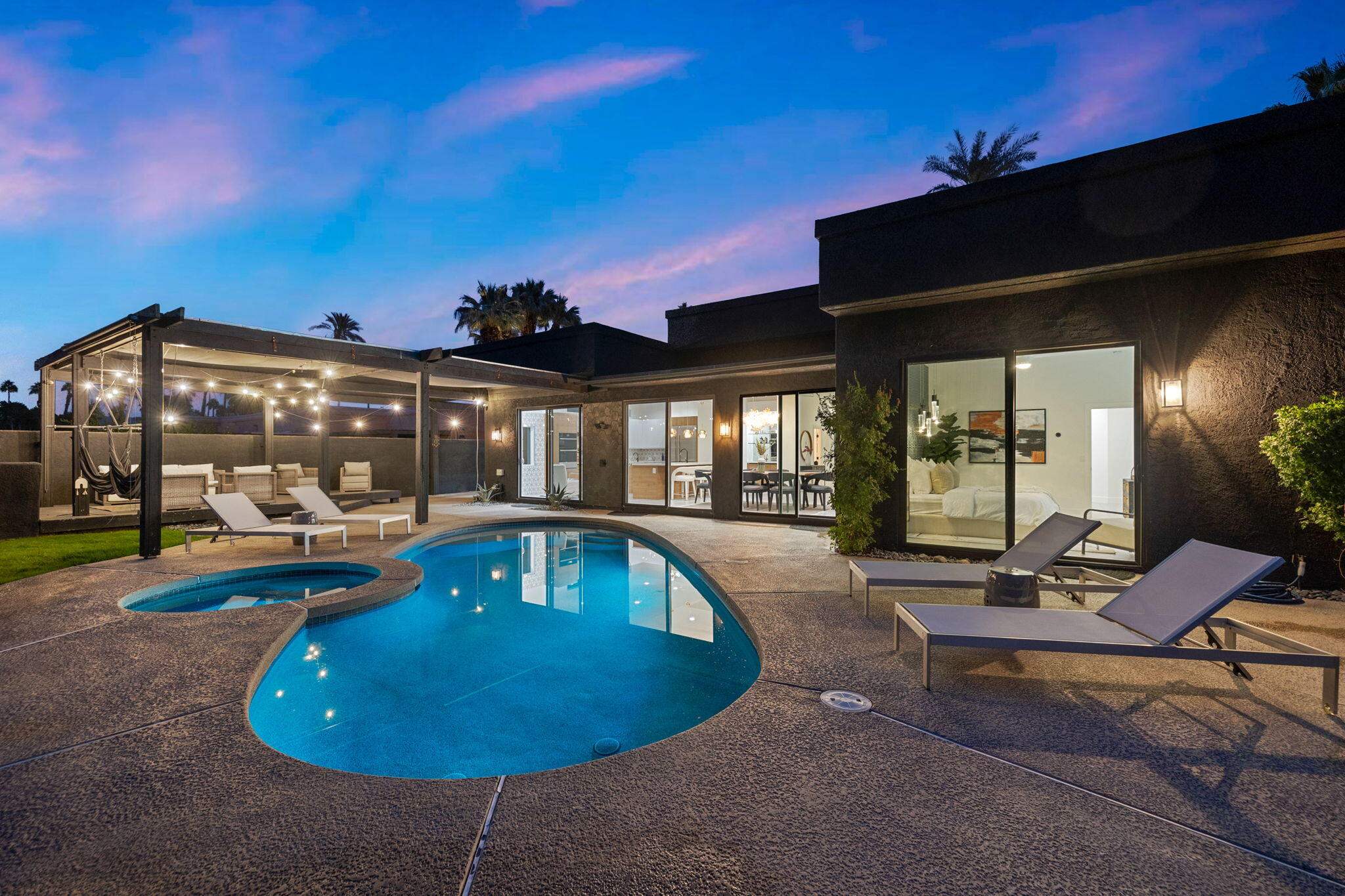 37011 Palmdale Road Rancho Mirage, CA 92270 - Photo 48 of 63 a view of a swimming pool with a patio