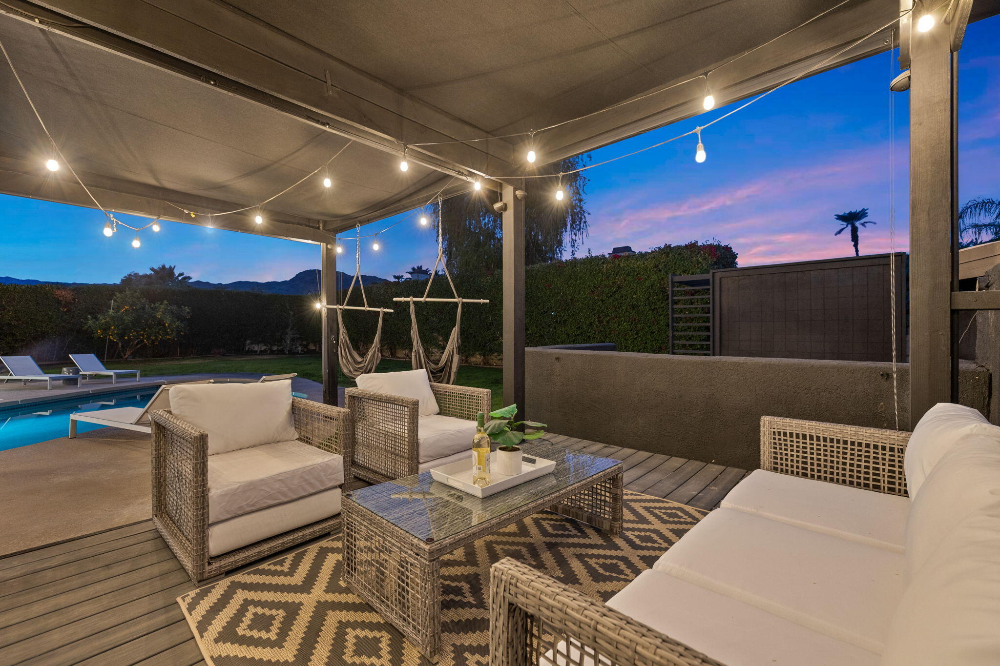 37011 Palmdale Road Rancho Mirage, CA 92270 - Photo 51 of 63 a view of a patio with couches table and chairs