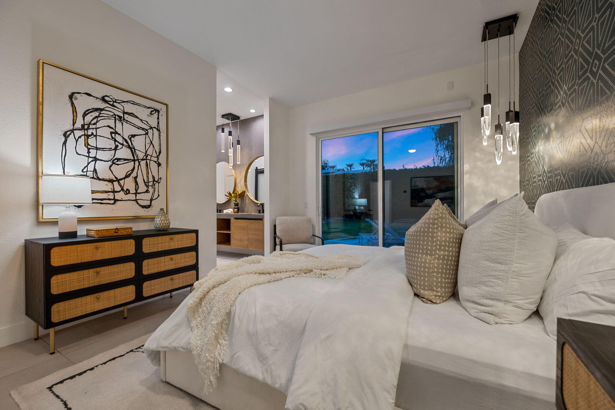 37011 Palmdale Road Rancho Mirage, CA 92270 - Photo 62 of 63 a bedroom with a bed and lamp