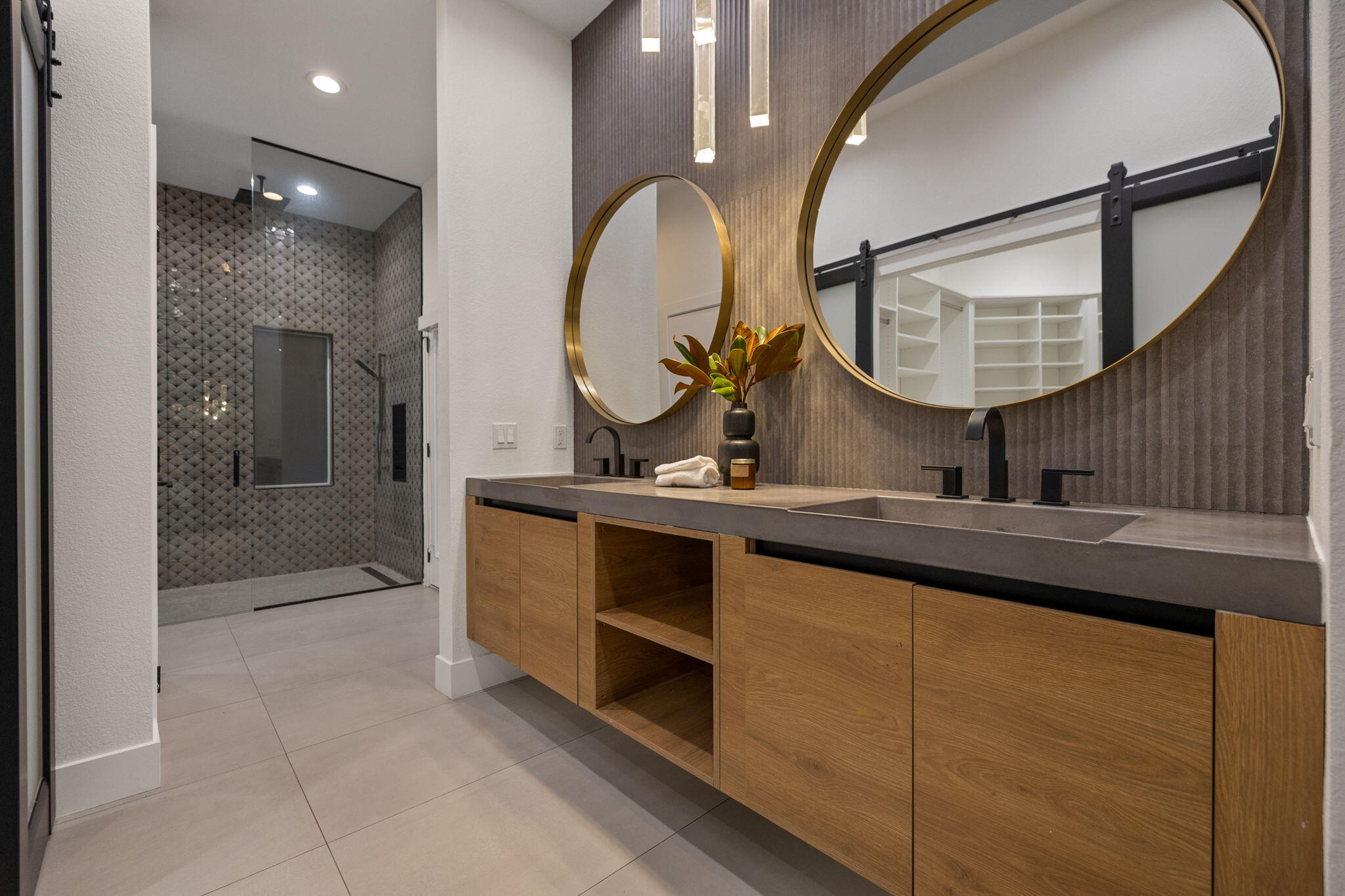 37011 Palmdale Road Rancho Mirage, CA 92270 - Photo 63 of 63 a bathroom with a sink and a mirror
