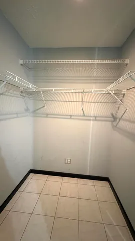 a view of a room with an empty space