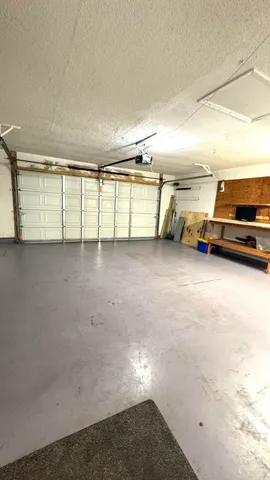 a view of a pathway both side of grassy field