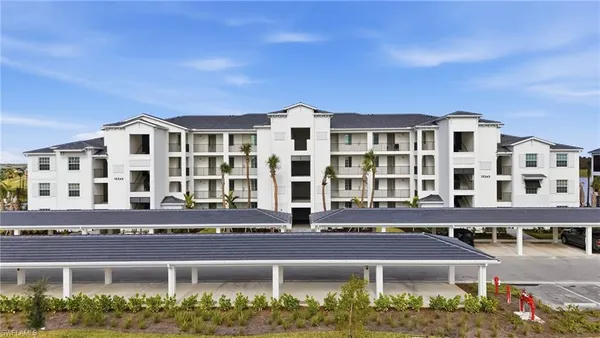 a front view of a building with street view