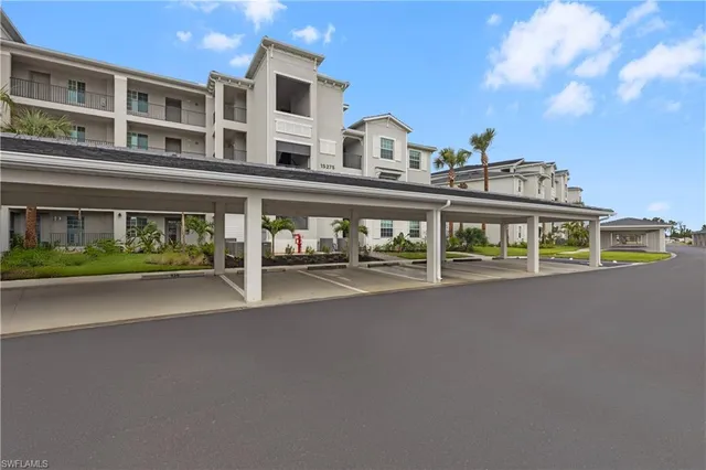 a multi story building with view of street