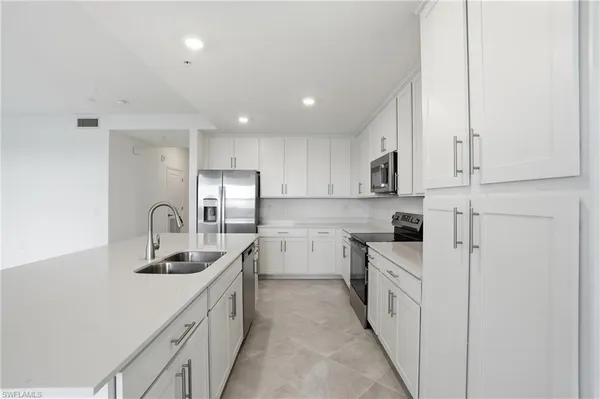 a view of living room with furniture and window