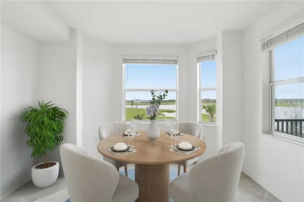 a bedroom with bed and wall painting