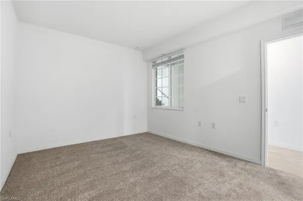 a bathroom with a shower and vanity