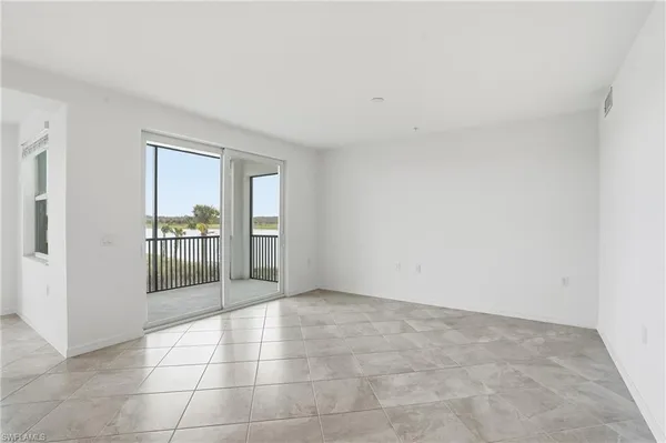 a view of a kitchen with a sink and a window