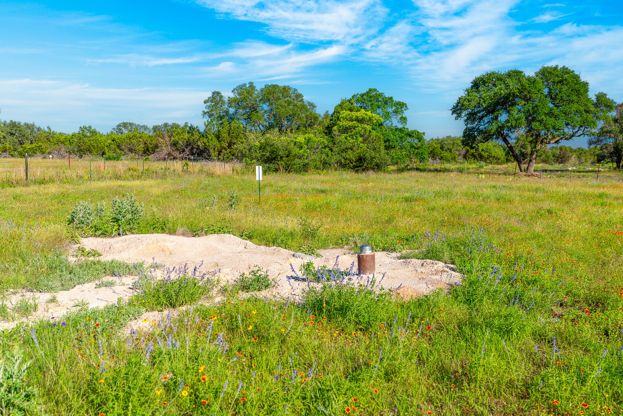 2 Feild Ranch Road Lampasas, TX 76550 - Photo 37 of 40 Vast green fields stretch under an open sky, offering ample space and serene natural views.