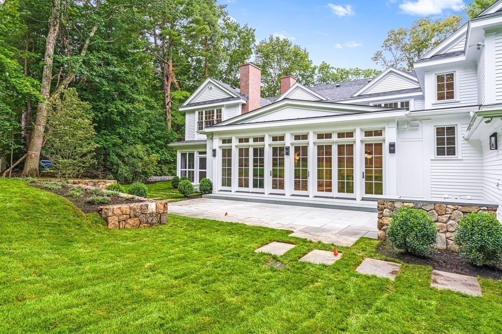 8 Lowell Road Wellesley, MA 02481 - Photo 14 of 16 front view of a house with a yard