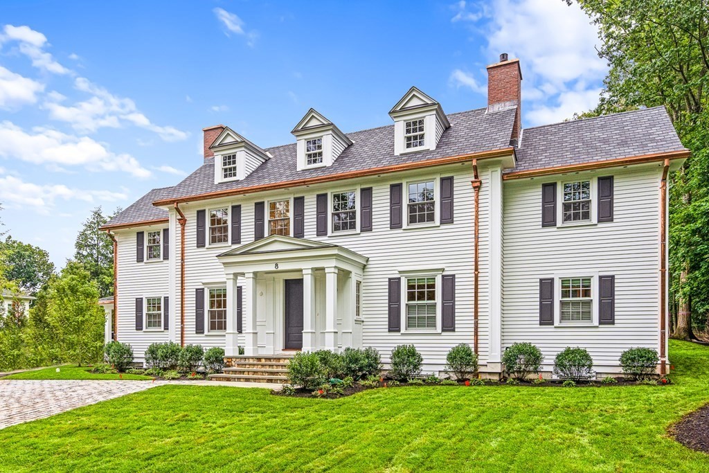 8 Lowell Road Wellesley, MA 02481 - Photo 2 of 16 a front view of a house with a yard