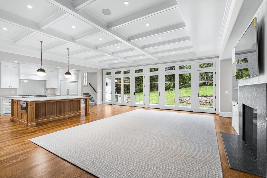 8 Lowell Road Wellesley, MA 02481 - Photo 6 of 16 a large white kitchen with granite countertop a stove and a large window