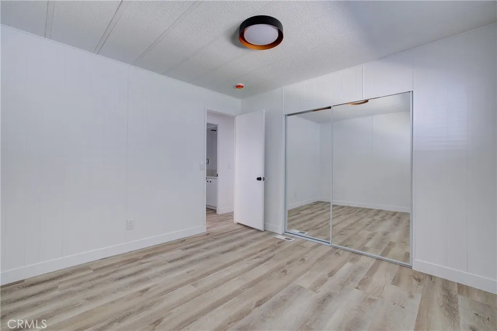 3700 Buchanan Street, Unit 164 Riverside, CA 92503 - Photo 22 of 40 a view of a room with wooden floor