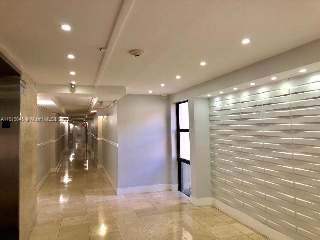 16919 North Bay Road, Unit 509 Sunny Isles Beach, FL 33160 - Photo 16 of 43 a view of a hallway
