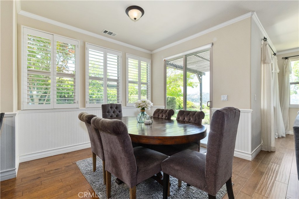 669 Red Cloud Road Paso Robles, CA 93446 - Photo 12 of 61 a dining room with furniture window wooden floor