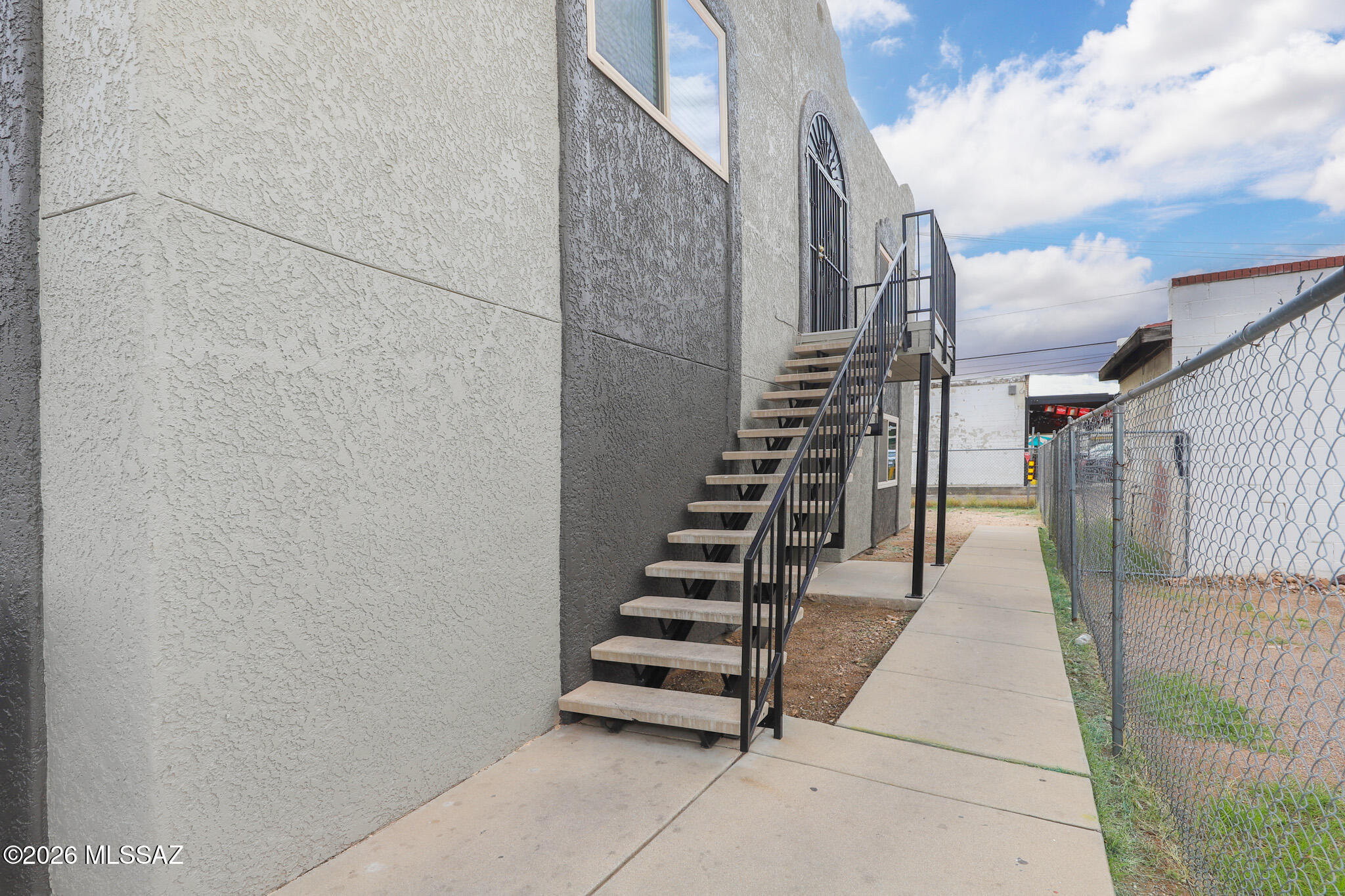 312 East 24th Street, Unit 4 Tucson, AZ 85713 - Photo 16 of 17 a view of stairs and hall